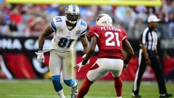 Dec. 16, 2012; Glendale, AZ, USA: Arizona Cardinals cornerback Patrick Peterson (21) defends Detroit Lions wide receiver Calvin Johnson (81) in the first quarter at University of Phoenix Stadium. Mandatory Credit: Mark J. Rebilas-USA TODAY Sports