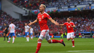 TOULOUSE, FRANCE - JUNE 20: Aaron Ramsey celebrates after scoring his goal during the UEFA EURO 2016 Group B match between Russia and Wales at Stadium Municipal on June 20, 2016 in Toulouse, France. (Photo by Stu Forster/Getty Images)