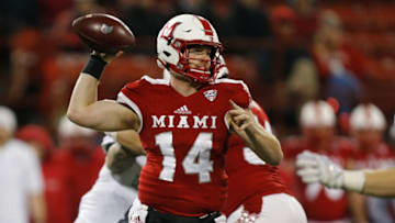 OXFORD, OH - NOVEMBER 15: Gus Ragland #14 of the Miami Ohio Redhawks throws a pass against the Eastern Michigan Eagles during the second half at Yager Stadium on November 15, 2017 in Oxford, Ohio. (Photo by Michael Reaves/Getty Images)