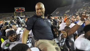 Dec 23, 2015; Mobile, AL, USA; Georgia Southern Eagles head coach Dell McGee is carried on to the field on the shoulders of his players after defeating the Bowling Green Falcons of the 2015 GoDaddy Bowl at Ladd-Peebles Stadium. Georgia Southern won 58-27. Mandatory Credit: Glenn Andrews-USA TODAY Sports