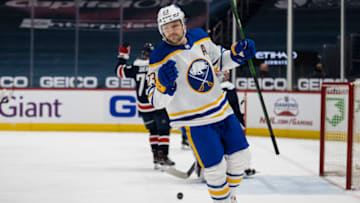 WASHINGTON, DC - APRIL 15: Sam Reinhart #23 of the Buffalo Sabres reacts after scoring a goal against the Washington Capitals during the first period at Capital One Arena on April 15, 2021 in Washington, DC. (Photo by Scott Taetsch/Getty Images)