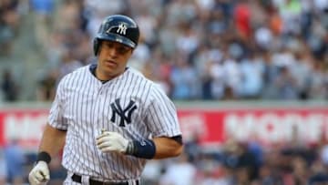 May 17, 2014; Bronx, NY, USA; New York Yankees first baseman Mark Teixeira (25) rounds the bases on his two run home run to right during the first inning against the Pittsburgh Pirates at Yankee Stadium. Mandatory Credit: Anthony Gruppuso-USA TODAY Sports