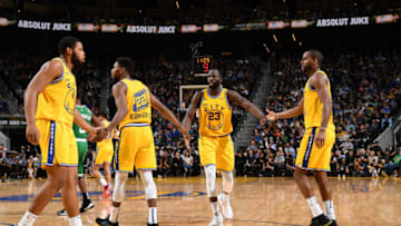 SAN FRANCISCO, CA - NOVEMBER 15: Draymond Green #23 of the Golden State Warriors hi-fives team mates during the game against the Boston Celtics on November 15, 2019 at Chase Center in San Francisco, California. NOTE TO USER: User expressly acknowledges and agrees that, by downloading and or using this photograph, user is consenting to the terms and conditions of Getty Images License Agreement. Mandatory Copyright Notice: Copyright 2019 NBAE (Photo by Noah Graham/NBAE via Getty Images)