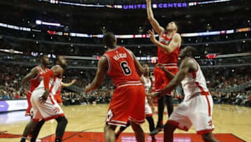 Feb 19, 2016; Chicago, IL, USA; Chicago Bulls forward Doug McDermott (3) shoots against the Toronto Raptors during the second half at United Center. Mandatory Credit: Kamil Krzaczynski-USA TODAY Sports