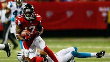 ATLANTA, GA - DECEMBER 28: Devin Hester #17 of the Atlanta Falcons is tackled by Colin Jones #42 of the Carolina Panthers in the second half at the Georgia Dome on December 28, 2014 in Atlanta, Georgia. (Photo by Kevin C. Cox/Getty Images)