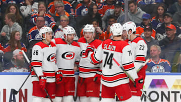 EDMONTON, AB - JANUARY 20: Carolina Hurricanes Defenceman Jaccob Slavin (74) and the Carolina Hurricanes celebrate their sixth goal of the game in the second period during the Edmonton Oilers game versus the Carolina Hurricanes on January 20, 2019 at Rogers Place in Edmonton, AB. (Photo by Curtis Comeau/Icon Sportswire via Getty Images)