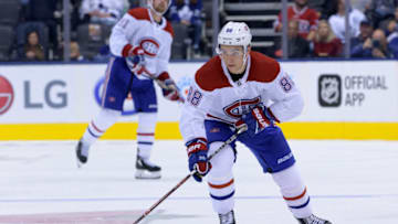 TORONTO, ON - SEPTEMBER 24: Montreal Canadiens Center Nick Suzuki (88) skates with the puck during the NHL preseason game between the Montreal Canadiens and the Toronto Maple Leafs on September 24, 2018, at Scotiabank Arena in Toronto, ON, Canada. (Photo by Julian Avram/Icon Sportswire via Getty Images)