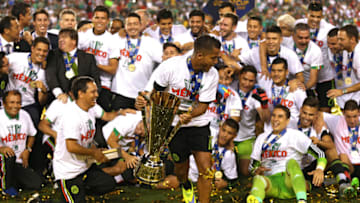PHILADELPHIA, PA - JULY 26: Giovani Dos Santos #10 of Mexico runs with the Gold Cup as Mexico celebrates after defeating Jamaica in the CONCACAF Gold Cup Final at Lincoln Financial Field on July 26, 2015 in Philadelphia, Pennsylvania. Mexico won, 3-1. (Photo by Patrick Smith/Getty Images)