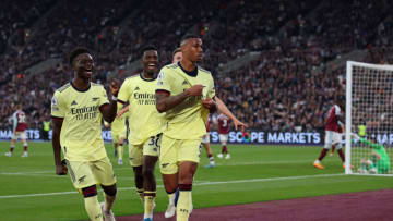 LONDON, ENGLAND - MAY 01: Gabriel of Arsenal celebrates scoring their side's second goal with teammates during the Premier League match between West Ham United and Arsenal at London Stadium on May 01, 2022 in London, England. (Photo by Julian Finney/Getty Images)