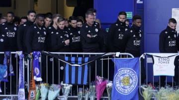 LEICESTER, ENGLAND - OCTOBER 29: Leicester City Football Club players pay their respects at the sea of tributes to the victims of the helicopter crash at Leicester City Football Club's King Power Stadium on October 28, 2018 in Leicester, England. The owner of Leicester City Football Club, Club owner Vichai Srivaddhanaprabha, was among the five people who died in the helicopter crash on Saturday evening after the club's game against West Ham. (Photo by Christopher Furlong/Getty Images)