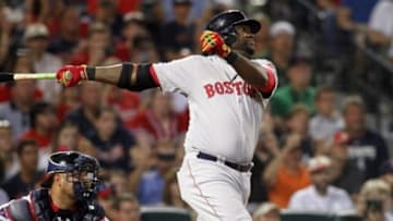 May 27, 2014; Atlanta, GA, USA; Boston Red Sox first baseman David Ortiz (34) hits a RBI single against the Atlanta Braves in the seventh inning at Turner Field. Mandatory Credit: Brett Davis-USA TODAY Sports