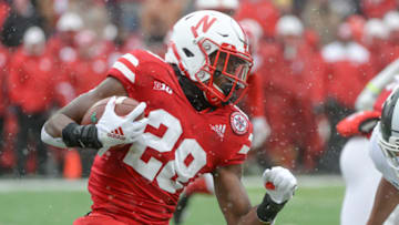 LINCOLN, NE - NOVEMBER 17: Running back Maurice Washington #28 of the Nebraska Cornhuskers runs against the Michigan State Spartans at Memorial Stadium on November 17, 2018 in Lincoln, Nebraska. (Photo by Steven Branscombe/Getty Images)