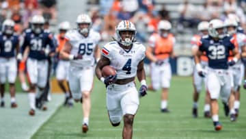 Auburn football running back Tank Bigsby (4) returns a kick during Auburn football A-Day spring game at Jordan-Hare Stadium in Auburn, Ala., on Saturday, April 17, 2021.
