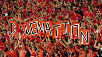 ATHENS, GA - AUGUST 30: Fans of the Georgia Bulldogs celebrate after a fourth quarter touchdown against the Clemson Tigers at Sanford Stadium on August 30, 2014 in Athens, Georgia. (Photo by Scott Cunningham/Getty Images)