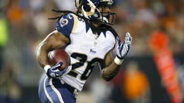 Aug 8, 2013; Cleveland, OH, USA; St. Louis Rams running back Daryl Richardson (26) runs the ball in the second quarter against the Cleveland Browns at FirstEnergy Stadium. Mandatory Credit: Rick Osentoski-USA TODAY Sports