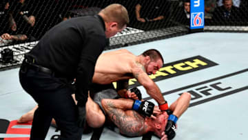 LAS VEGAS, NEVADA - DECEMBER 14: Matt Brown finishes Ben Saunders in their welterweight bout during the UFC 245 event at T-Mobile Arena on December 14, 2019 in Las Vegas, Nevada. (Photo by Jeff Bottari/Zuffa LLC)