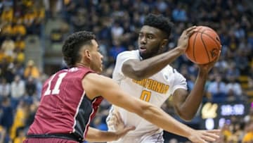 Feb 6, 2016; Berkeley, CA, USA; California Golden Bears forward Jaylen Brown (0) tries to get around Stanford Cardinal guard Dorian Pickens (11) in the first half at Haas Pavilion. Mandatory Credit: John Hefti-USA TODAY Sports.