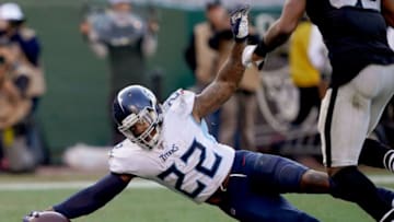 OAKLAND, CALIFORNIA - DECEMBER 08: Derrick Henry #22 of the Tennessee Titans scores on a ten yard touchdown run against the Oakland Raiders during the second half of an NFL football gamer at RingCentral Coliseum on December 08, 2019 in Oakland, California. The Titans won the game 42-21. (Photo by Thearon W. Henderson/Getty Images)