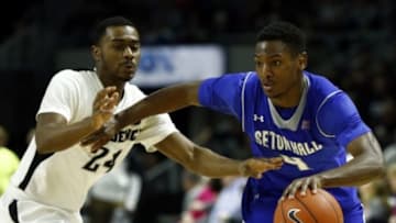 Feb 14, 2015; Providence, RI, USA; Seton Hall Pirates guard Sterling Gibbs (4) drives to the basket against Providence Friars guard Kyron Cartwright (24) during the seond half at Dunkin Donuts Center. Mandatory Credit: Mark L. Baer-USA TODAY Sports