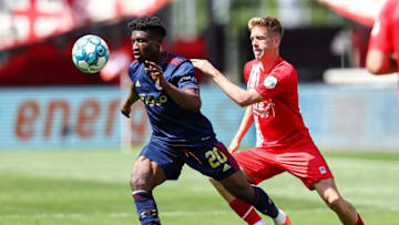 Ajax's Mohammed Kudus (L) and FC Twente's Gijs Smal fight for the ball during the Dutch Eredivisie premier league match between FC Twente and Ajax at Stadion De Grolsch Veste in Enschede on May 28, 2023. (Photo by Vincent Jannink / ANP / AFP) / Netherlands OUT (Photo by VINCENT JANNINK/ANP/AFP via Getty Images)