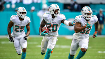 MIAMI, FL - SEPTEMBER 09: Reshad Jones #20 of the Miami Dolphins runs with an interception during the third quarter against the Tennessee Titans at Hard Rock Stadium on September 9, 2018 in Miami, Florida. (Photo by Mark Brown/Getty Images)