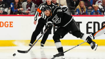 Dec 29, 2022; Denver, Colorado, USA; Los Angeles Kings right wing Viktor Arvidsson (33) shoots the puck the third period against the Colorado Avalanche at Ball Arena. Mandatory Credit: Ron Chenoy-USA TODAY Sports