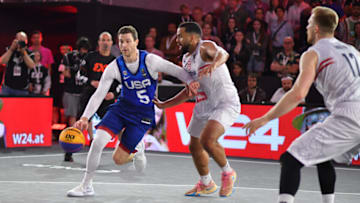 VIENNA, AUSTRIA JUNE 2: Jimmer Fredette of the USA vies with Nico Kaltenbrunner of Austria during the mens pool play match between A5ustria and the USA on Day 4 of the FIBA 3x3 World cup at Rathausplatz on June 2, 2023 in Vienna, Austria. (Photo by Andrea Kareth /SEPA.Media /Getty Images)