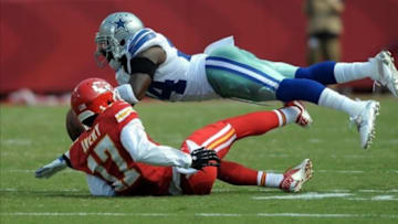 Sep 15, 2013; Kansas City, MO, USA; Dallas Cowboys cornerback Morris Claiborne (24) breaks up a pass intended for Kansas City Chiefs wide receiver Donnie Avery (17) during the second half at Arrowhead Stadium. The Chiefs won 17-16. Mandatory Credit: Denny Medley-USA TODAY Sports