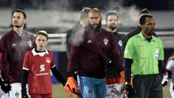 COMMERCE CITY, CO - FEBRUARY 20: Colorado Rapids goalkeeper Tim Howard, middle, walks onto the field before the game as temperatures plummet to 3 degrees at the start of the game on February 20, 2018 in Commerce City, Colorado. This is the first round of 16 in the CONCACAF Champions League game at Dick's Sporting Goods Park. The Colorado Rapids take on the defending MLS Cup champs in tonight's game. The coldest game on record is 19 degrees at kickoff. Tonight's game could be much colder. (Photo by Helen H. Richardson/The Denver Post via Getty Images)