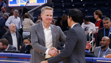 Steve Kerr head coach of the Golden State Warriors shakes hands with Erik Spoelstra head coach of the Miami Heat(Photo by Lachlan Cunningham/Getty Images)