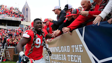 ATLANTA, GA - NOVEMBER 25: Michael Barnett #94 of the Georgia football Bulldogs celebrates beating the Georgia Tech Yellow Jackets at Bobby Dodd Stadium on November 25, 2017 in Atlanta, Georgia. (Photo by Daniel Shirey/Getty Images)