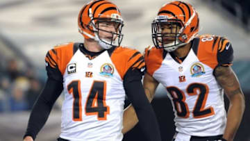 Dec 13, 2012; Philadelphia, PA, USA; Cincinnati Bengals quarterback Andy Dalton (14) celebrates his touchdown run with wide receiver Marvin Jones (82) in the third quarter at Lincoln Financial Field. The Bengals defeated the Eagles 34-13. Mandatory Credit: Eric Hartline-USA TODAY Sports