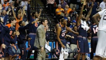 Mar 11, 2015; Nashville, TN, USA; The Auburn Tigers players react from the bench against the Mississippi State Bulldogs second half of the first round of the SEC Conference Tournament at Bridgestone Arena. Mandatory Credit: Joshua Lindsey-USA TODAY Sports
