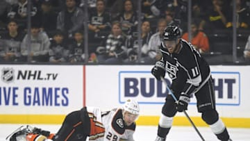 LOS ANGELES, CALIFORNIA - SEPTEMBER 23: Devin Shore #29 of the Anaheim Ducks dives to knock the puck over the blue line away from Anze Kopitar #11 of the Los Angeles Kings during the first period of a preseason game against the Anaheim Ducks at Staples Center on September 23, 2019 in Los Angeles, California. (Photo by Harry How/Getty Images)