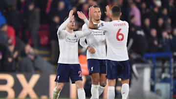 LONDON, ENGLAND - NOVEMBER 23: Andy Robertson of Liverpool embraces Dejan Lovren of Liverpool during the Premier League match between Crystal Palace and Liverpool FC at Selhurst Park on November 23, 2019 in London, United Kingdom. (Photo by Justin Setterfield/Getty Images)