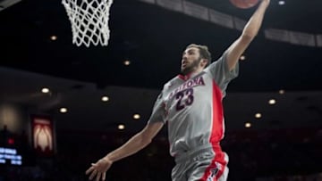 Jan 30, 2016; Tucson, AZ, USA; Arizona Wildcats forward Mark Tollefsen (23) dunks the ball during the second half against the Oregon State Beavers at McKale Center. Arizona won 80-63. Mandatory Credit: Casey Sapio-USA TODAY Sports