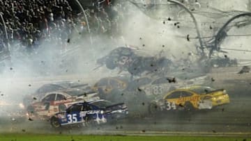 Jul 6, 2015; Daytona Beach, FL, USA;NASCAR Sprint Cup Series driver Austin Dillon car (3) crashes against the catch fence during the finish of the Coke Zero 400 at Daytona International Speedway. Mandatory Credit: Reinhold Matay-USA TODAY Sports