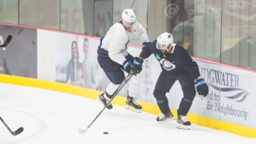 Winnipeg Jets, Matthieu Perreault (85), Patrik Laine (29) Mandatory Credit: Terrence Lee-USA TODAY Sports