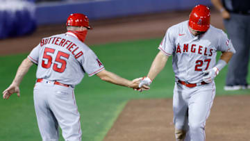 DUNEDIN, FLORIDA - APRIL 08: Mike Trout #27 of the Los Angeles Angels celebrates a home run with third base coach Brian Butterfield #55 during the fifth inning against the Toronto Blue Jays during the season home opener at TD Ballpark on April 08, 2021 in Dunedin, Florida. (Photo by Douglas P. DeFelice/Getty Images)