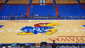Dec 31, 2022; Lawrence, Kansas, USA; A general view of the center court logo prior to a game between the Kansas Jayhawks and Oklahoma State Cowboys at Allen Fieldhouse. Mandatory Credit: Denny Medley-USA TODAY Sports
