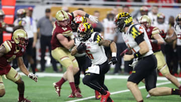 DETROIT, MI - DECEMBER 26: Ty Johnson #6 of the Maryland Terrapins runs for a short gain during the second quarter of the game against the Boston College Eagles at Ford Field on December 26, 2016 in Detroit, Michigan. (Photo by Leon Halip/Getty Images)