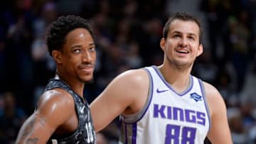 SAN ANTONIO, TX - MARCH 31: DeMar DeRozan #10 of the San Antonio Spurs and Nemanja Bjelica #88 of the Sacramento Kings look on during the game on March 31, 2019 at the AT&T Center in San Antonio, Texas. NOTE TO USER: User expressly acknowledges and agrees that, by downloading and or using this photograph, user is consenting to the terms and conditions of the Getty Images License Agreement. Mandatory Copyright Notice: Copyright 2019 NBAE (Photos by Mark Sobhani/NBAE via Getty Images)