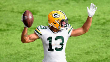 MINNEAPOLIS, MINNESOTA - SEPTEMBER 13: Allen Lazard #13 of the Green Bay Packers celebrates scoring a touchdown against the Minnesota Vikings during the fourth quarter of the game at U.S. Bank Stadium on September 13, 2020 in Minneapolis, Minnesota. The Packers defeated the Vikings 43-34. (Photo by Hannah Foslien/Getty Images)