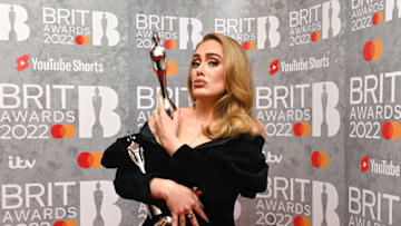 LONDON, ENGLAND - FEBRUARY 08: (EDITORIAL USE ONLY) Adele poses with her award in the media room during The BRIT Awards 2022 at The O2 Arena on February 08, 2022 in London, England. (Photo by Kate Green/Getty Images )