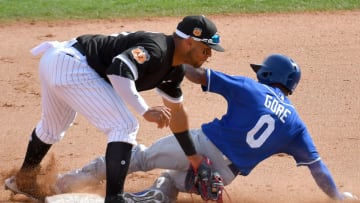 The Kansas City Royals' Terrance Gore (0) steals second under the tag from Chicago White Sox second baseman Yoan Moncada in the eighth inning in Glendale, Ariz., on Wednesday, March 15, 2017. The White Sox won, 7-3. (John Sleezer/Kansas City Star/TNS via Getty Images)