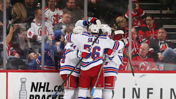 NEWARK, NJ - APRIL 01: Members of the New York Rangers celebrate a first period goal by teammate Brett Howden #21 against the New Jersey Devils at the Prudential Center on April 1, 2019 in Newark, New Jersey. (Photo by Andy Marlin/NHLI via Getty Images)
