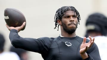 A fellow Pac-12 quarterback who transferred from the FCS level believes Shedeur Sanders will "be great" for Colorado football (Photo by Matthew Stockman/Getty Images)