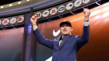May 8, 2014; New York, NY, USA; Johnny Manziel (Texas A&M) gestures on stage after being selected as the number twenty-two overall pick in the first round of the 2014 NFL Draft to the Cleveland Browns at Radio City Music Hall. Mandatory Credit: Adam Hunger-USA TODAY Sports