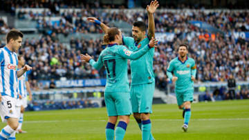 SAN SEBASTIAN, SPAIN - DECEMBER 14: Antoine Griezmann of FC Barcelona celebrates 1-1 with Luis Suarez of FC Barcelona during the La Liga Santander match between Real Sociedad v FC Barcelona at the Estadio Anoeta on December 14, 2019 in San Sebastian Spain (Photo by David S. Bustamante/Soccrates/Getty Images)