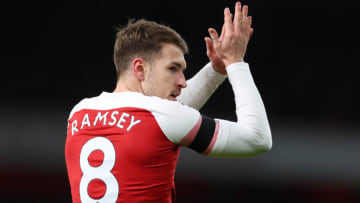 LONDON, ENGLAND - JANUARY 01: Aaron Ramsey of Arsenal celebrates after scoring his team's third goal during the Premier League match between Arsenal FC and Fulham FC at Emirates Stadium on January 1, 2019 in London, United Kingdom. (Photo by Catherine Ivill/Getty Images)